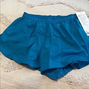 Lululemon Dolphin-Hem MR Run Short 3” size XXS